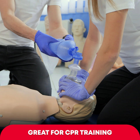 Adult and infant CPR mask kit with bag-valve-mask and gloves on a CPR training mannequin