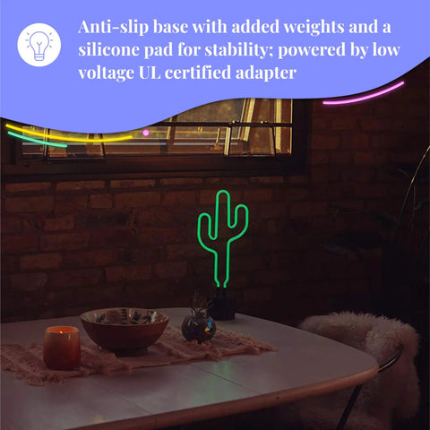 Green Neon Cactus Desk Light That Is Lit For Any Room on table, glowing in dark room, near window with cozy decor.