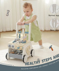 Dad Approved Solid Wood Toddler Walker Tool Table With Interactive Building Blocks Realistic Hammer Wrench Gear Station For Growing Hands And Brainy Play Light Gray, child pushing walker with tools.