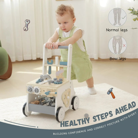 Dad Approved Solid Wood Toddler Walker Tool Table With Interactive Building Blocks Realistic Hammer Wrench Gear Station For Growing Hands And Brainy Play Light Gray, child pushing walker with tools.