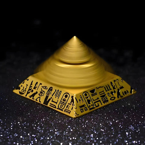 Three Layer Rotating Pyramid Fidget Toy For Stress Relief Desk Meditation Accessory Brass Office Decor Boss Gift Father's Day Christmas Gift Luxury Executive Desk Accessory Premium Spin Toy Boss Mode made of brass spinning on a glittering surface.
