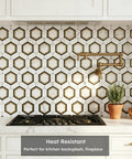 Peel And Stick Hexagon Backsplash Tiles In White And Gold With Marble Veins above a kitchen stove, self-adhesive PVC.