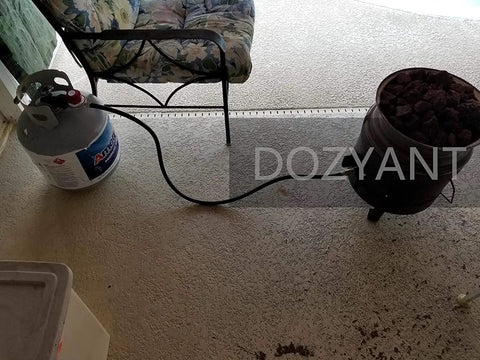 Adjustable 0 To 20 PSI Propane Regulator With Five Foot Hose For QCC1 Type1 Tanks connected to a grill and patio heater