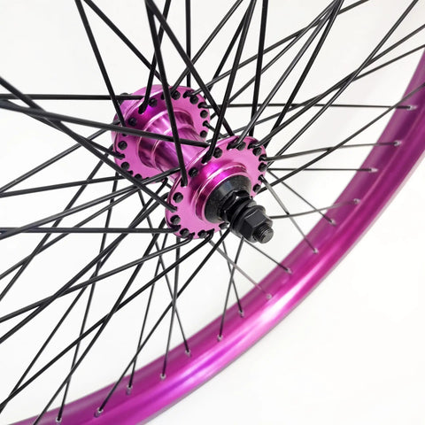 Close-up of Purple 26 Inch Heavy Duty Bike Rim Wheel Set With Double Wall Aluminum Alloy 12 Gauge 48 Spokes. Front hub view.