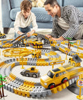 Father and son playing with Construction Race Track Toy Set For Toddlers And Boys 2 To 6 With 200 Flexible Tracks