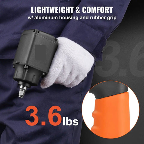 Workhorse Pneumatic Impact Wrench Breaking 690 Ft Lbs Torque On Frozen Nuts With A 3/8 Inch Square Drive showcasing lightweight aluminum housing and rubber grip.