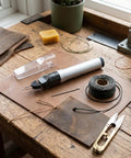 Dang Handy Tungsten Thread Burner Craft Pen For Trimming Frayed Ends Quick on a craft table with leather and threads.