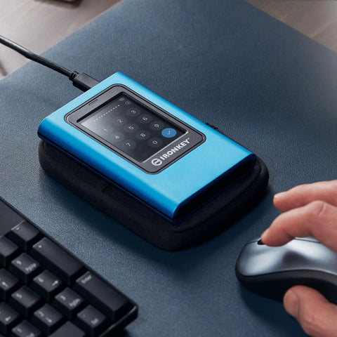 Vault Privacy 80 External SSD With FIPS 197 Encryption And XTS AES 256 Bit Encryption Plus Touch Screen PIN on desk.