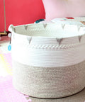 Huge Boho Blanket Basket 22 By 22 By 16 Inches Cotton Rope Storage Hamper For Throws Pillows Towels And Laundry Foldable Durable Decorative Round Organizer For Living Room Brown in a bright room.