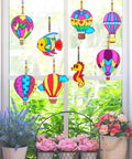 Colorful window with 30 Set Hot Air Balloon Sun Catcher Craft Kit For DIY Window Art Easy Setup Family Fun Kid Friendly displayed