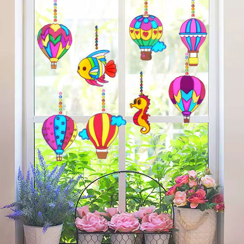Colorful window with 30 Set Hot Air Balloon Sun Catcher Craft Kit For DIY Window Art Easy Setup Family Fun Kid Friendly displayed
