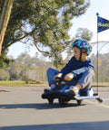 Child riding Crazy Cart Shift Electric Go Kart for Kids Ages 6 and Up 12V Drifting System with High and Low Speed Switch outdoors