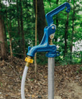 25 Ft RV Drinking Water Hose Lead Free BPA Free And Phthalate Free With Diamond Hatch Reinforced PVC connected to blue hydrant