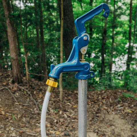 25 Ft RV Drinking Water Hose Lead Free BPA Free And Phthalate Free With Diamond Hatch Reinforced PVC connected to blue hydrant