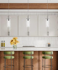 Bubble Glass Crystal Pendant Lights 3-Pack For Kitchen Island over a wooden counter with green stools and floral decoration