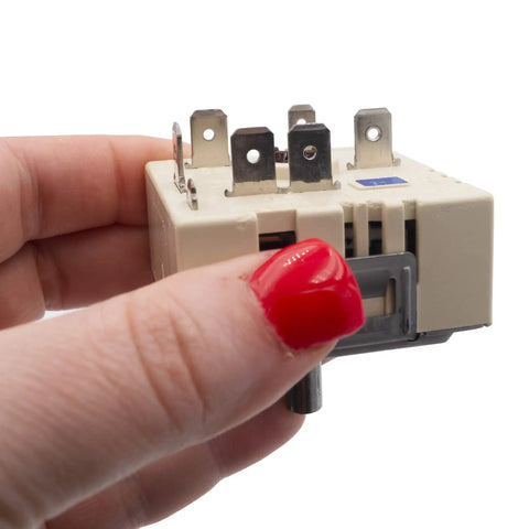 Hand holding Model Specific Infinite Control Switch Replacement For Electric Range Fits WB24T10058 WB24T10031 240V 15A 2600W Plug In Easy Install Heating Control Not Universal Stove Repair Part For Home Kitchens
