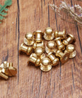 Slick Gold Brass Chicago Screws Combined With Round Head Button Studs For Rock Solid Hardware Fittings And Handymen Diy Fixes In A Sweet Fifteen Pack that includes 15 brass button studs.