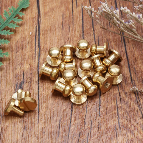 Slick Gold Brass Chicago Screws Combined With Round Head Button Studs For Rock Solid Hardware Fittings And Handymen Diy Fixes In A Sweet Fifteen Pack that includes 15 brass button studs.