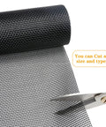 Heavy Duty Pet Proof Window Screen Replacement 39W X 100L Thick Charcoal Mesh with scissors cutting the mesh on a roll