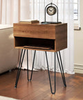 Wooden nightstand with Hairpin Table Legs 18 Inch Set Of 4 Solid Steel Heavy Duty Black, supporting books and a clock.