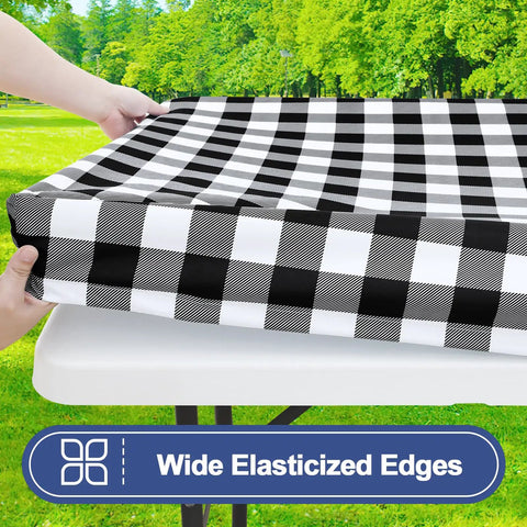 Waterproof Elastic Fitted 6Ft Picnic Table Cloth 2 Pack Buffalo Plaid Black White 30x72 Inches being put on a table