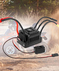 60A Waterproof Dustproof Brushless ESC With Sensorless Tech for 1/10 RC cars, T plug compatibility, on outdoor dusty trail.