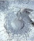Shattered window displaying Ultimate Security Window Film 8 Mil Clear For Home Or Office Absorbs Break In Blows And Keeps Shattered Glass In Place Interior Install 36 Inch By 49 Foot Roll ANSI Z97.1 Class B And CPSC Category 1 Approved Boosts Safety And Protection.