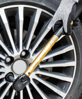 Twenty Two Piece Torque Wrench Set Half Inch Drive Ten To One Hundred Eighty Foot Pounds And Thirteen Point Six To Two Hundred Forty Four Point One Nm Includes Impact Sockets Seventy Two Tooth Quick Release Ratchet And Click Torque For DIY Car Repair, shown tightening car wheel lug nuts