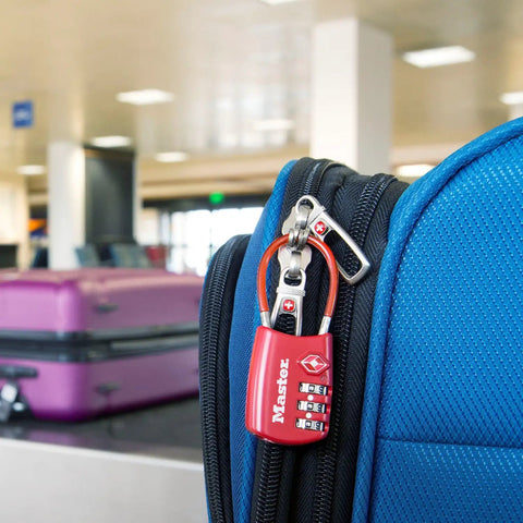 Set Your Own 3 Digit TSA Approved Luggage Lock For Travel, Durable Metal Body, on a blue suitcase at airport baggage claim.
