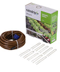 Drip Irrigation Kit For Vegetable Gardens With Fifty Feet Of One Quarter Inch Dripline, Three Quarter Inch FHT Adapter, Ten Hold-Down Stakes, And End Plug - No-Fuss Quick Setup Garden Watering System To Save Time And Water box and components