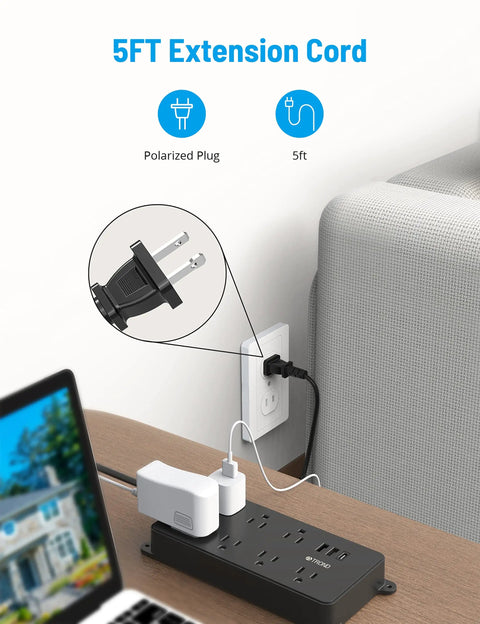 2 Prong To 3 Prong Power Strip With 7 Widely Spaced Outlets And 3 USB Ports Including USB C 5 Foot Extension Cord Wall Mountable 1700J Surge Protector For Non Grounded Plugs Black in use on desk near wall socket