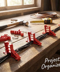 Lothee 200 Pack Red Cable Staples Clips With Steel Nails organizing black cables on a wooden workbench with tools.
