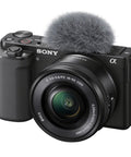 ZV-E10 Mirrorless Camera Kit With 16-50mm Lens displayed, showing front view and attached microphone