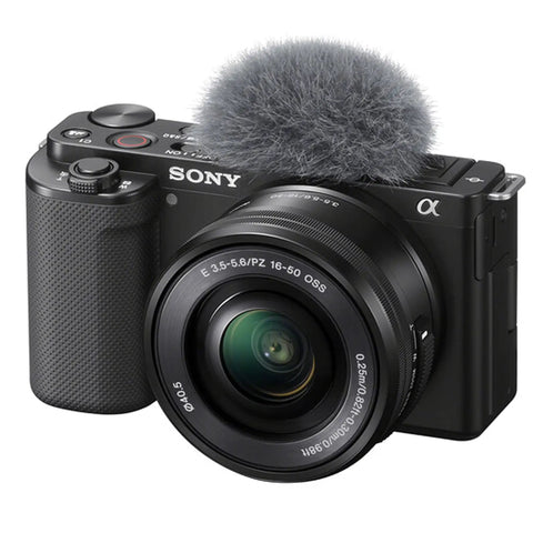 ZV-E10 Mirrorless Camera Kit With 16-50mm Lens displayed, showing front view and attached microphone