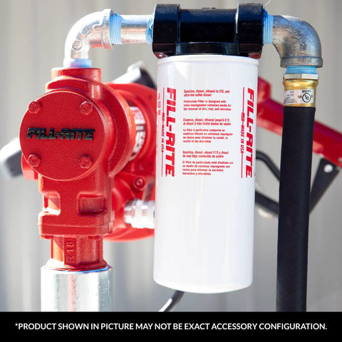 Three Quarter Inch Thread Spin On Fuel Filter With Ten Micron Rating For Up To Twenty Five GPM Fuel Transfer Systems Protect Pumps Engines And Injectors In Auto And Industrial Setups attached to a red fuel pump