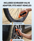 Orange AstroAI digital tire pressure gauge with backlit display, Presta/Schrader adapters, for bike and car tires.