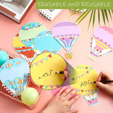 Hands writing on Colorful Fun Hot Air Balloon Cutouts Set Of 45 5 By 7 Inch Classroom Bulletin Board Accents For Back To School