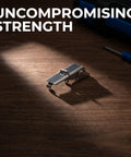 Heavy Duty Adjustable Stainless Steel Toggle Latch Hardware For Machinery Cabinet Doors With Vibration Resistant Anti Slip Polished Locking System Perfect For Toolbox And Industrial Draw Fastener Needs Now on a wooden surface with tools.