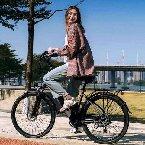 Person riding High Power 1000W Peak Electric Bike For Adults With 22 MPH Top Speed And 60 Mile Range 26 Inch Commuter E Bike