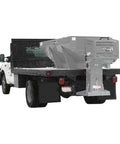 Commercial Gas Powered Stainless Steel Hopper Spreader With Extension Chute 2 Cubic Yard Tank mounted on a truck for snow removal.