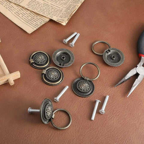 Antique Bronze Drawer Pull Rings Set Of 6 With Screws Vintage Cabinet Hardware 1.18 Inch Solid Zinc Alloy Knobs shown on leather surface.