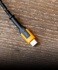 Heavy Duty USB A To USB C Charging Cable Premium Braided Nylon With Kevlar Reinforcement on wooden surface