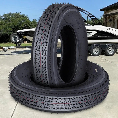 Heavy Duty Trailer Tire Set With 6PR Load Range C 12 Inch All Weather Tires in front of utility boat and trailer