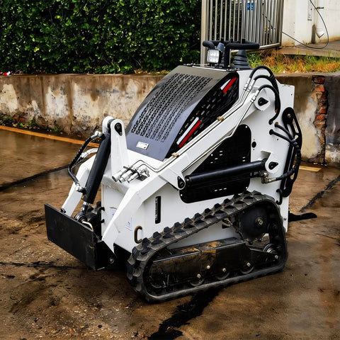 Compact Crawler Mini Skid Steer Loader With Deepened Bucket For Construction Barn Cleaning And Landscaping Stand On Skid Steer Loader With Reinforced Frame For Farm And Industrial Use Built Tough With Custom Upgrades And Easy Accessory Options on concrete surface