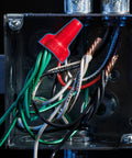 Red Wing-Nut 452 Wire Connector for DIY electrical splices in metal box, showing assembled wires and copolymer shell.