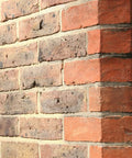 Red brick wall treated with One And A Half Gallon Clear Brick Sealer For Brick Stone Concrete And Masonry No Nonsense Cream Based Water Repellent