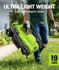 Man carrying 13 Inch Electric Lawn Mower With 1300W Corded Power Lightweight And Compact Gate Friendly walking on grass.