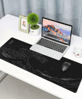 Ultra Smooth Large Gaming Mouse Pad With No Slip Rubber Base Waterproof Edges And Stitched Finish For Gaming Office And Home 31.5 By 11.8 Inches Black Wave on desk