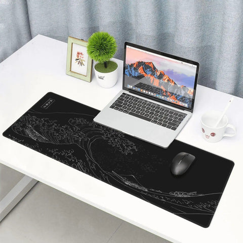 Ultra Smooth Large Gaming Mouse Pad With No Slip Rubber Base Waterproof Edges And Stitched Finish For Gaming Office And Home 31.5 By 11.8 Inches Black Wave on desk