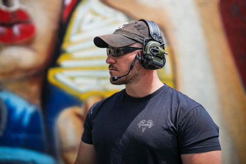 Man wearing Fugitive TAC Spartan Version 2.5 Photochromic Sunglasses For Men Built For Day And Night Use Tactical Eye Protection